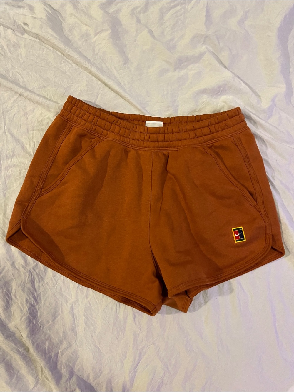 Nike Women's Rust Orange Athletic Shorts